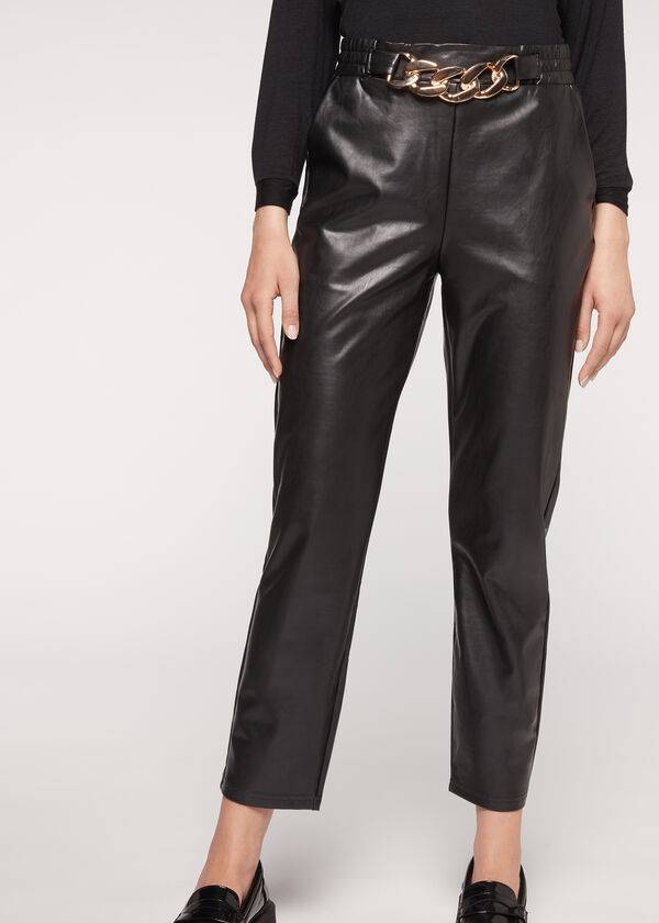 pantaloni neri da donna calzedonia effetto spalmato termico con finiture a catena