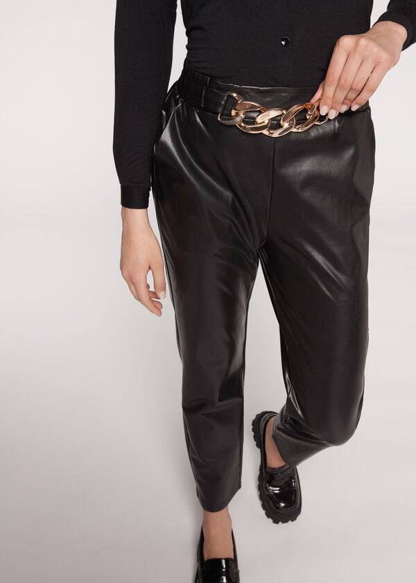 pantaloni neri da donna calzedonia effetto spalmato termico con finiture a catena