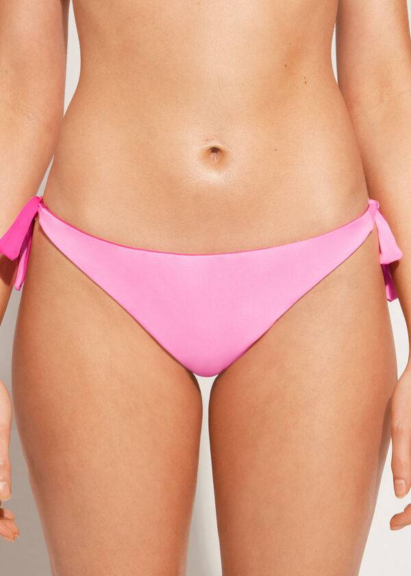 slip bikini brasiliano indonesiano ecologico con fiocco da donna calzedonia rosa