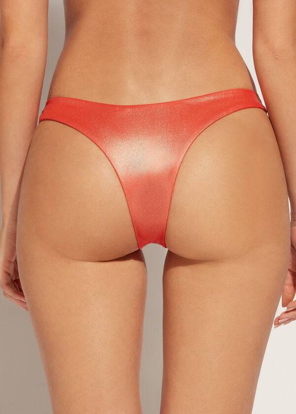 slip bikini brasiliano antigua da donna con scollo alto e effetto spalmato color corallo e arancione calzedonia