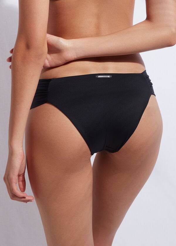 slip bikini con volant indonesia da donna calzedonia nero