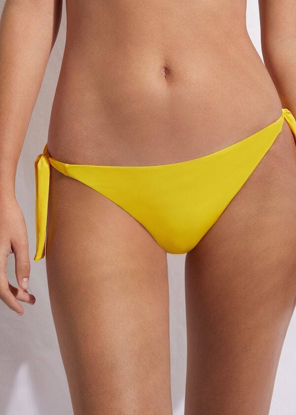 slip bikini con lacci laterali eco indonesia calzedonia da donna giallo