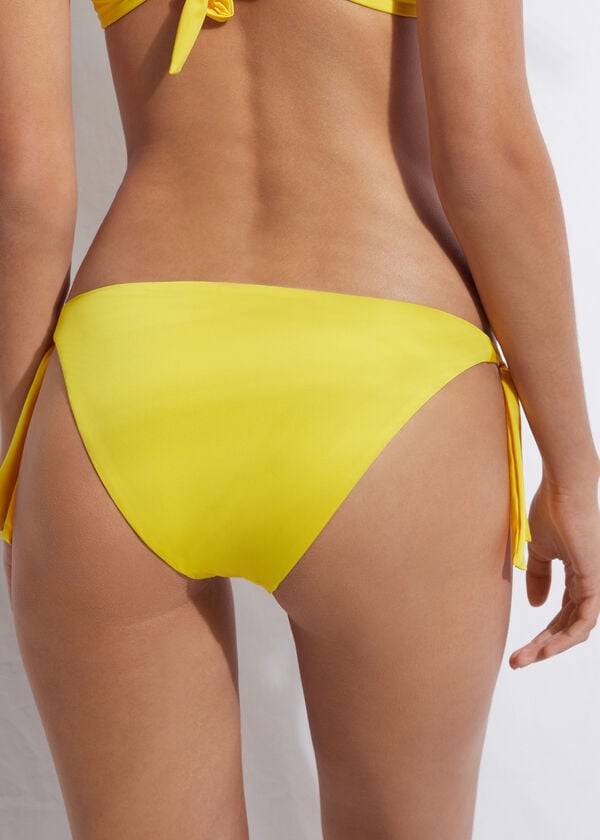 slip bikini con lacci laterali eco indonesia calzedonia da donna giallo