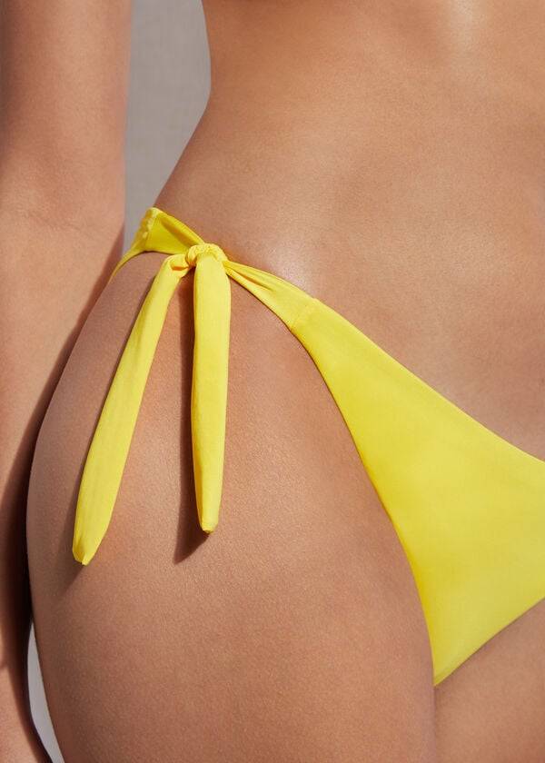 slip bikini con lacci laterali eco indonesia calzedonia da donna giallo